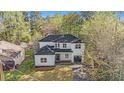 Charming exterior view of a modern home with a well-maintained yard at 3444 Underwood Se Ct, Conyers, GA 30013
