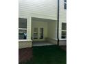 Covered patio area with double doors for easy indoor/outdoor living at 4180 Cavalier Way, Duluth, GA 30097