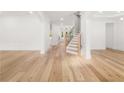 Bright and spacious foyer with hardwood floors and a staircase at 2339 Eastwood Dr, Snellville, GA 30078