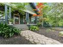 Beautiful home with a cozy front porch and a walkway leading to the front door at 541 Greenwood Ne Ave, Atlanta, GA 30308