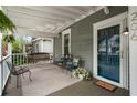 Inviting covered porch with seating, creating a cozy outdoor space to enjoy the neighborhood views at 206 Flora Ne Ave, Atlanta, GA 30307