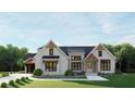Beautiful home exterior featuring a well-manicured lawn, lovely landscaping, and charming architectural details at 2468 Rockbridge Nw Rd, Conyers, GA 30012