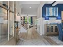 Inviting entryway with hardwood floors, staircase, and stylish decor at 211 Linford Dr, Locust Grove, GA 30248