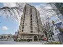 Upscale high-rise building with balconies, covered entry, and convenient street access at 3334 Peachtree Ne Rd # 101, Atlanta, GA 30326