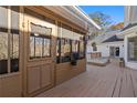 A view of the spacious deck and screened porch, ideal for outdoor gatherings and relaxation at 1019 Henna Se Ct, Conyers, GA 30013
