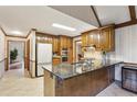 Kitchen with granite counters, stainless appliances, and wood cabinets at 3298 Robinson Oaks Ne Way, Marietta, GA 30062