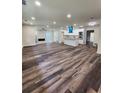 Spacious living room featuring modern wood flooring and an open floor plan with recessed lighting at 188 Oak Dr, Atlanta, GA 30354