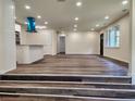Bright open-plan living space with new laminate flooring, recessed lights, and an airy feel at 188 Oak Dr, Atlanta, GA 30354