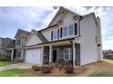 Charming two-story home with stone accents and manicured front lawn at 200 Eva Way Ne, Cartersville, GA 30121