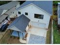 Aerial view showcases the property's driveway, carport, and the home's overall position in the neighborhood at 2167 Main Nw St, Atlanta, GA 30318