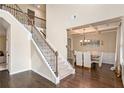 Staircase and dining room with coffered ceiling at 113 Osier Dr, Mcdonough, GA 30252