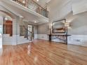 Spacious living room featuring hardwood floors, high ceilings, and decorative molding at 139 Grandmar Chase, Canton, GA 30115
