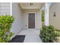 Inviting front porch with a classic door, manicured bushes, and house number displayed on the column at 3475 Ridge Hill Pkwy, Douglasville, GA 30135