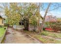 Lovely home featuring driveway, mature trees, and flowering bushes at 1388 Metropolitan Se Ave, Atlanta, GA 30316
