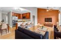 Bright living room featuring an open floor plan, modern kitchen with stainless steel appliances, and a cozy seating area at 1628 Briarcliff Ne Rd # 15, Atlanta, GA 30306