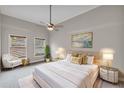 Serene main bedroom boasting a tray ceiling, fan, natural light, and stylish decor at 1628 Briarcliff Ne Rd # 15, Atlanta, GA 30306