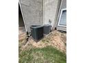 Outdoor AC units sitting on a grassy area near the building exterior at 3575 Oakvale Rd # 1103, Decatur, GA 30034