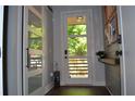 Bright entryway with hardwood floors, decorative accents, and a glass paneled door allowing natural light to fill the space at 1350 May Avenue # 14, Atlanta, GA 30316