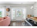 Cozy entryway with natural light, stylish decor, and a view of the front door at 1700 Prospect Way, Conyers, GA 30094