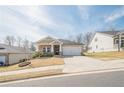 Beautiful one-story home with a well-maintained lawn and a wide driveway, perfect for a Gathering at 422 Murphy Avenue, Canton, GA 30114