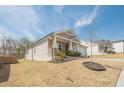 A beautiful view of the yard and home which offers great curb appeal in a wonderful neighborhood at 422 Murphy Avenue, Canton, GA 30114