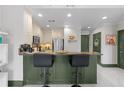 Charming kitchen with granite countertops, barstool seating, and stainless steel appliances at 2255 Peachtree Ne Rd # 521, Atlanta, GA 30309