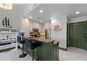 Modern kitchen with granite countertops, stainless steel appliances, and a breakfast bar with seating at 2255 Peachtree Ne Rd # 521, Atlanta, GA 30309
