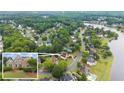 Aerial view of the neighborhood with beautiful houses, mature trees, and a lake at 1721 Mulberry Lake Dr, Dacula, GA 30019
