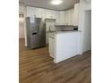 Bright kitchen featuring stainless steel appliances and stone countertops at 2041 Olive Springs Rd, Marietta, GA 30060