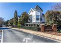 Charming townhomes at Glenwood Green with well-maintained landscaping and a community sign at 951 Glenwood Se Ave # 1805, Atlanta, GA 30316