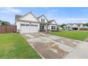 Charming one-story home with a two-car garage, a well-kept lawn, and long drive providing ample parking at 39 Summer Nw Pl, Cartersville, GA 30121
