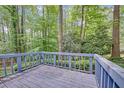 Spacious wooden deck overlooking a private backyard, perfect for outdoor entertaining and relaxation at 4856 Rock Haven Dr, Lilburn, GA 30047