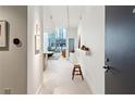 Hallway with art, views of living area, and a modern aesthetic at 845 Spring Nw St # 408, Atlanta, GA 30308
