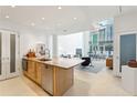 Spacious kitchen open to the living area, featuring modern appliances at 845 Spring Nw St # 408, Atlanta, GA 30308