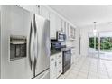 Kitchen featuring stainless steel appliances, granite countertops, and ample cabinet space at 1934 Mcconnell Rd, Grayson, GA 30017