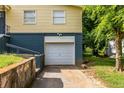 Attached one car garage with overhead lighting and updated door at 110 Turman Se Ave, Atlanta, GA 30315