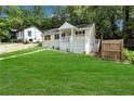 Inviting single-story home with a spacious front yard and mature trees at 2084 Bethel Nw Dr, Atlanta, GA 30314