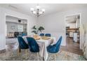 Bright dining room featuring elegant decor, stylish furnishings, and seamless flow to the living spaces at 1625 Summit View Way, Snellville, GA 30078