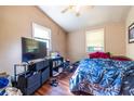 Standard bedroom with a hardwood floor, good natural light, and fair closet space at 120 Turman Se Ave, Atlanta, GA 30315