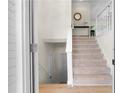 Inviting foyer with hardwood floors and staircase leading to the upper level at 223 Old Alabama Se Rd, Emerson, GA 30137