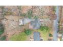 Aerial view of a home showing the backyard deck and surrounding trees at 2044 Wilandrew Dr, Decatur, GA 30033