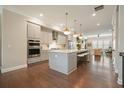 Bright, modern kitchen with a spacious island and stainless steel appliances at 1598 Aldworth Se Pl, Marietta, GA 30067