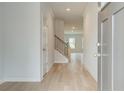 Inviting foyer with hardwood floors and stairway leading to the upper level at 257 Tulip Dr, Covington, GA 30016