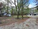 Wide view of property showing the house and separate dwelling at 12778 Cumming Hwy, Canton, GA 30115