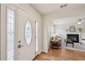 Welcoming foyer view showcasing the front door and entry into the comfortable living room at 5273 High Tide Ct, Atlanta, GA 30349