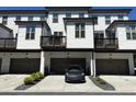 Modern townhouse featuring a private garage and balcony offering a stylish urban living experience at 2893 Elmwood Dr, Smyrna, GA 30080