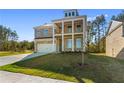 Brick two-story home boasts a welcoming porch and a well-maintained lawn, enhancing its curb appeal at 101 Belvedere Rd, Mcdonough, GA 30253