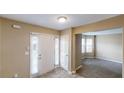 Welcoming entryway with large front door, tiled flooring, and great natural light at 5246 Salem Springs Pl, Lithonia, GA 30038