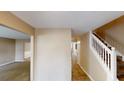 Spacious hallway with staircase and tiled flooring at 5246 Salem Springs Pl, Lithonia, GA 30038