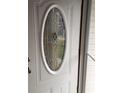 Detailed view of the front door with decorative glass insert at 636 North Ave # H-10, Jonesboro, GA 30236